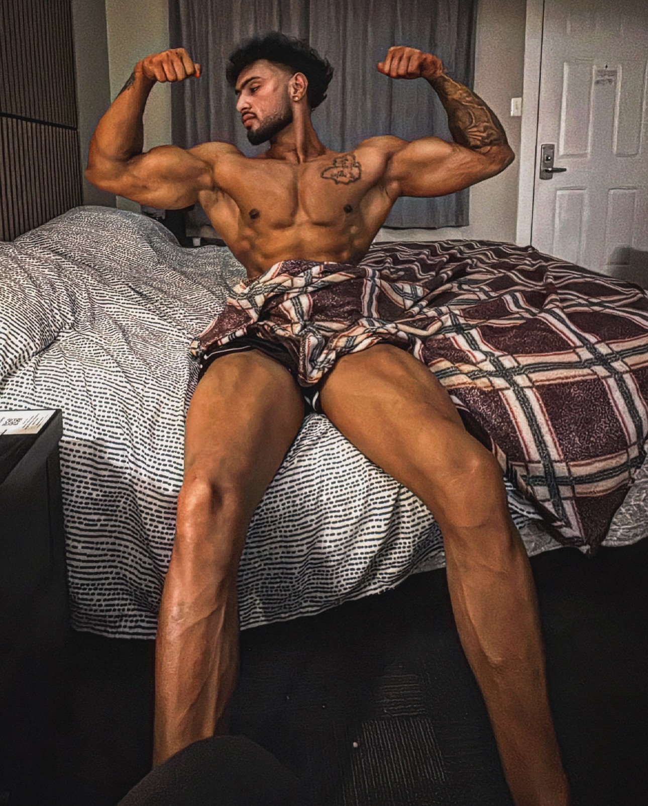 Mandip Singh showing the physique he has built through training
